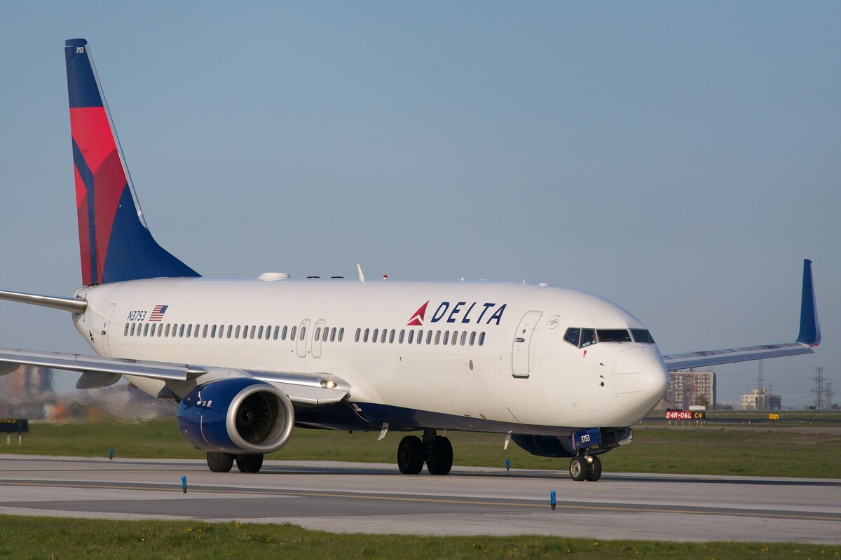 Delta Air Lines Boeing Jet on a runway.